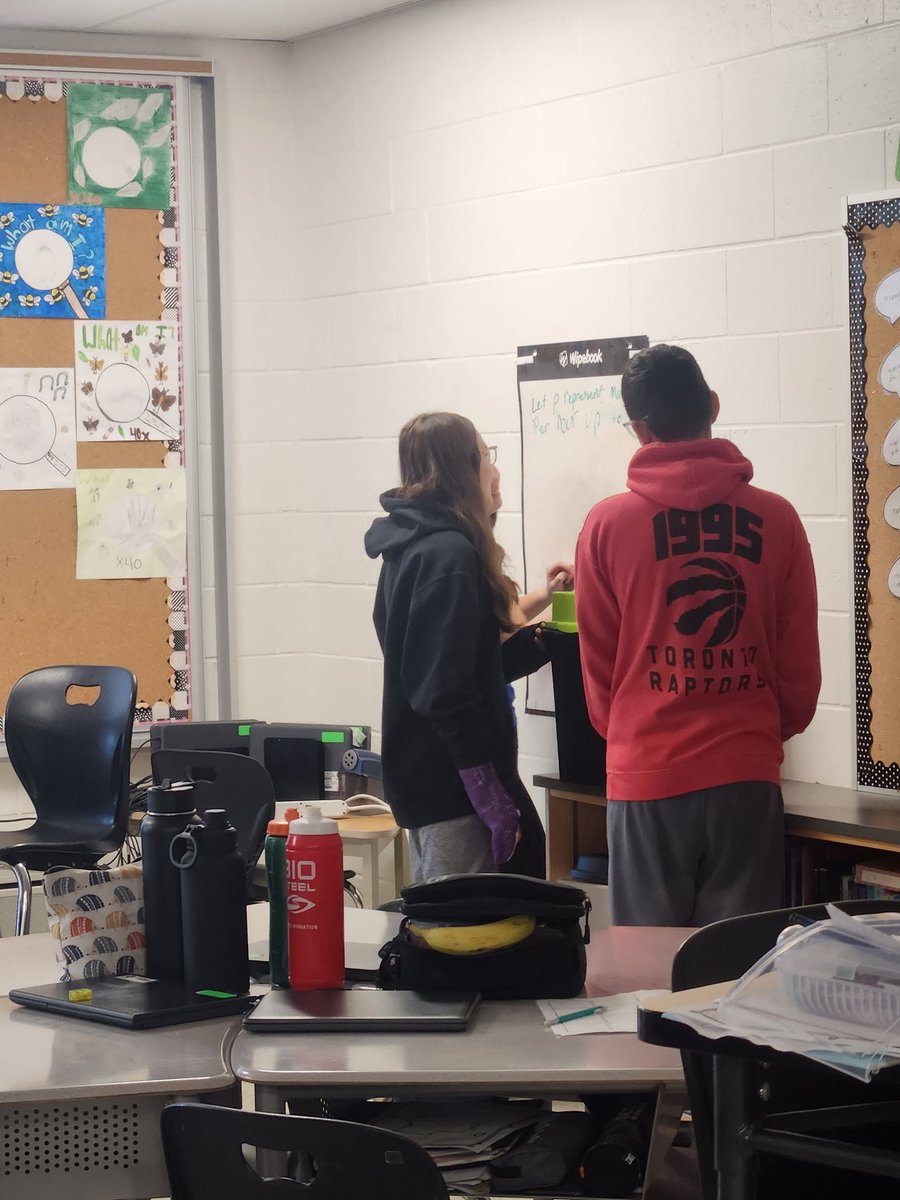 Working through some difficult word problems as a team. <a href="/svdptiger/">St. Vincent de Paul</a>