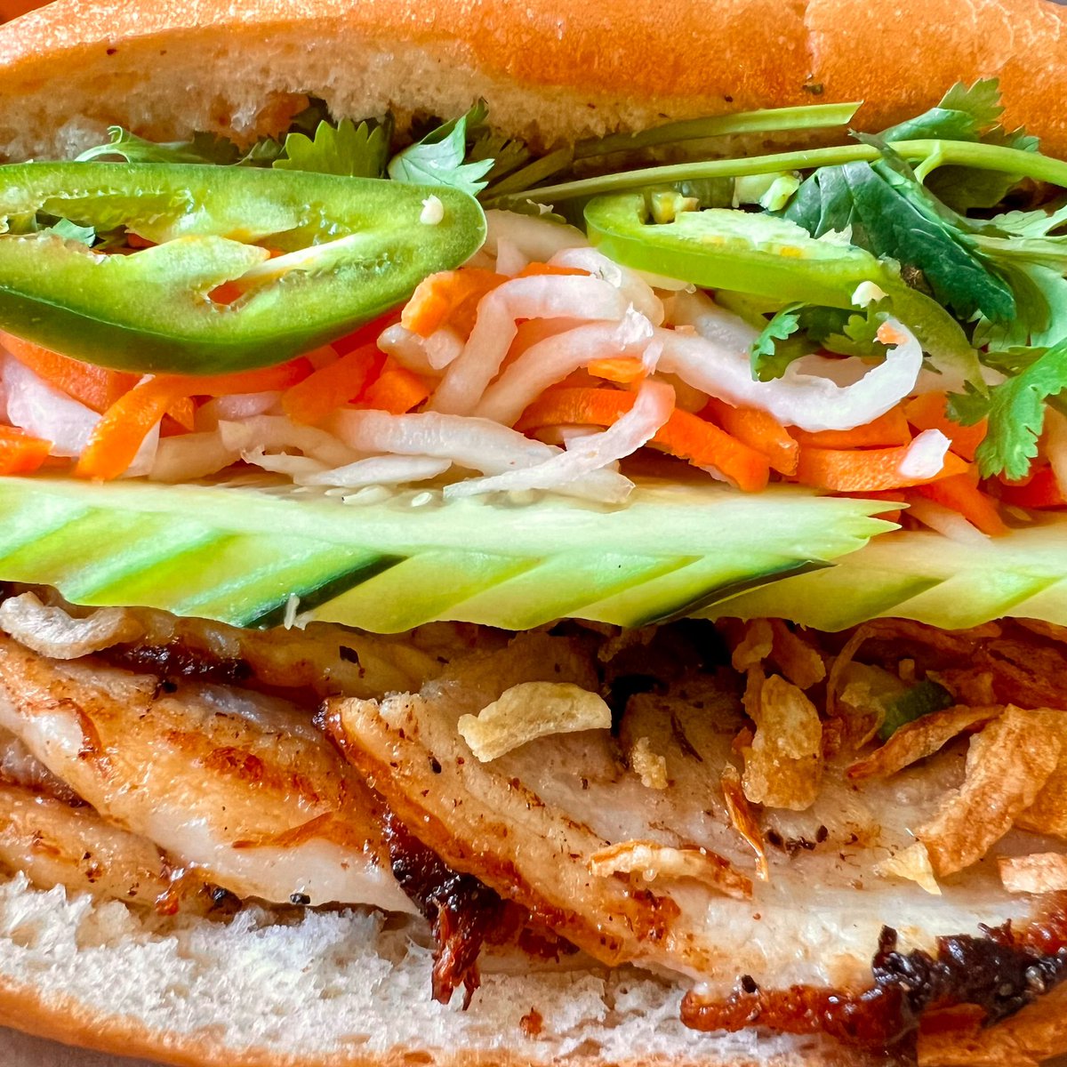 The perfect stacked Bánh Mì, the MBM Porchetta with slow roasted pork belly 🥵 Order yours from today through Saturday, open 10:30 AM to 4:30 PM.