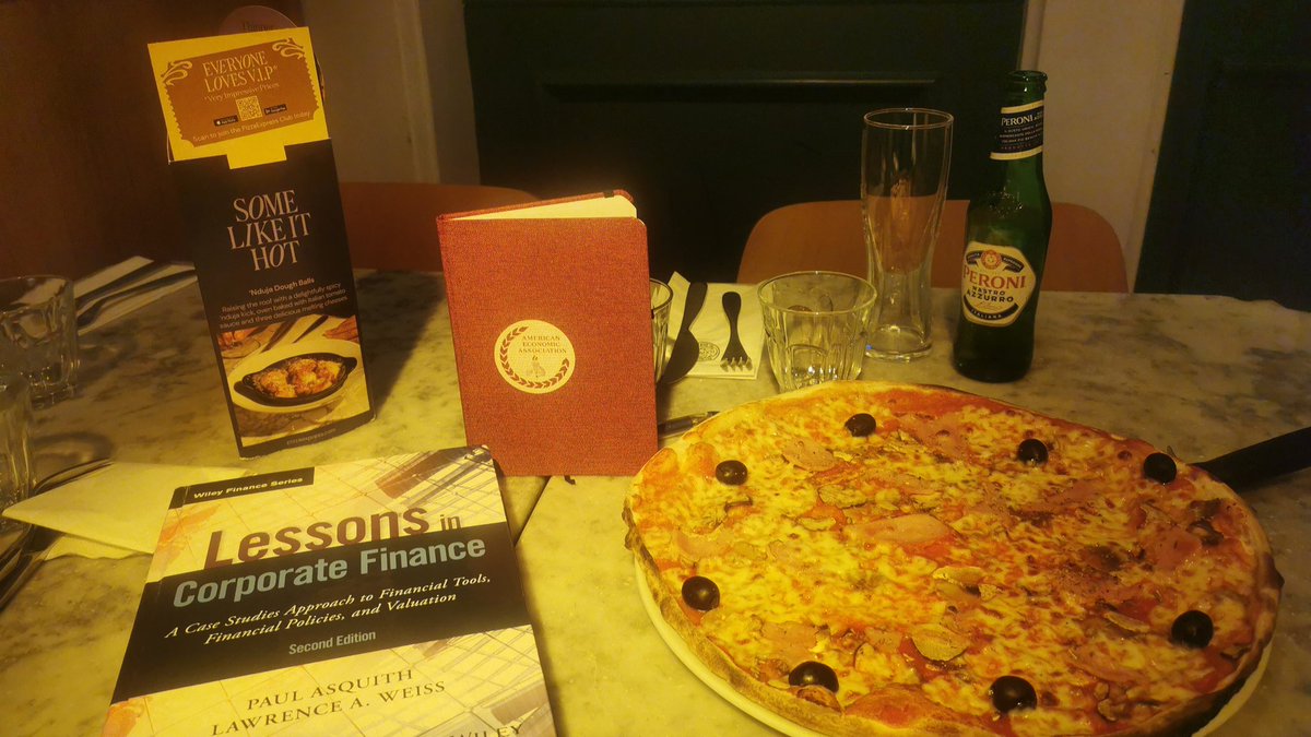 skokas01's tweet photo. Post #ASSA2024, Dinner with a side of corporate finance. Wrapping up my lecture prep with pizza and insights from 'Lessons in Corporate Finance'. Nothing like a good slice to accompany the final touches on tomorrow's slides. #FinanceAndPizza #CorporateFinance #LecturePrep https://t.co/6QoQJI6h63