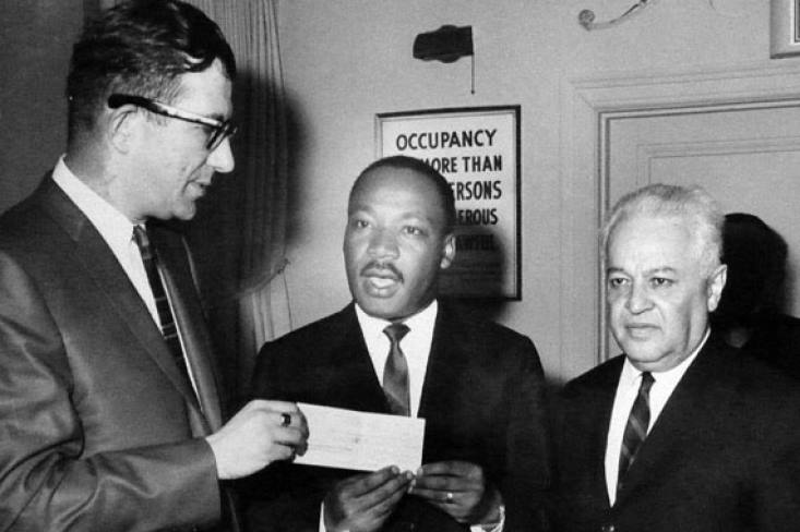 In March '65, the #UnitedFederationofTeachers bought 4 cars for Martin Luther King Jr.'s voter registration drive. Al Shanker handed over the keys and registrations, pledged assistance in getting voters to the polls safely, and added a check to fund the voter registration drive.