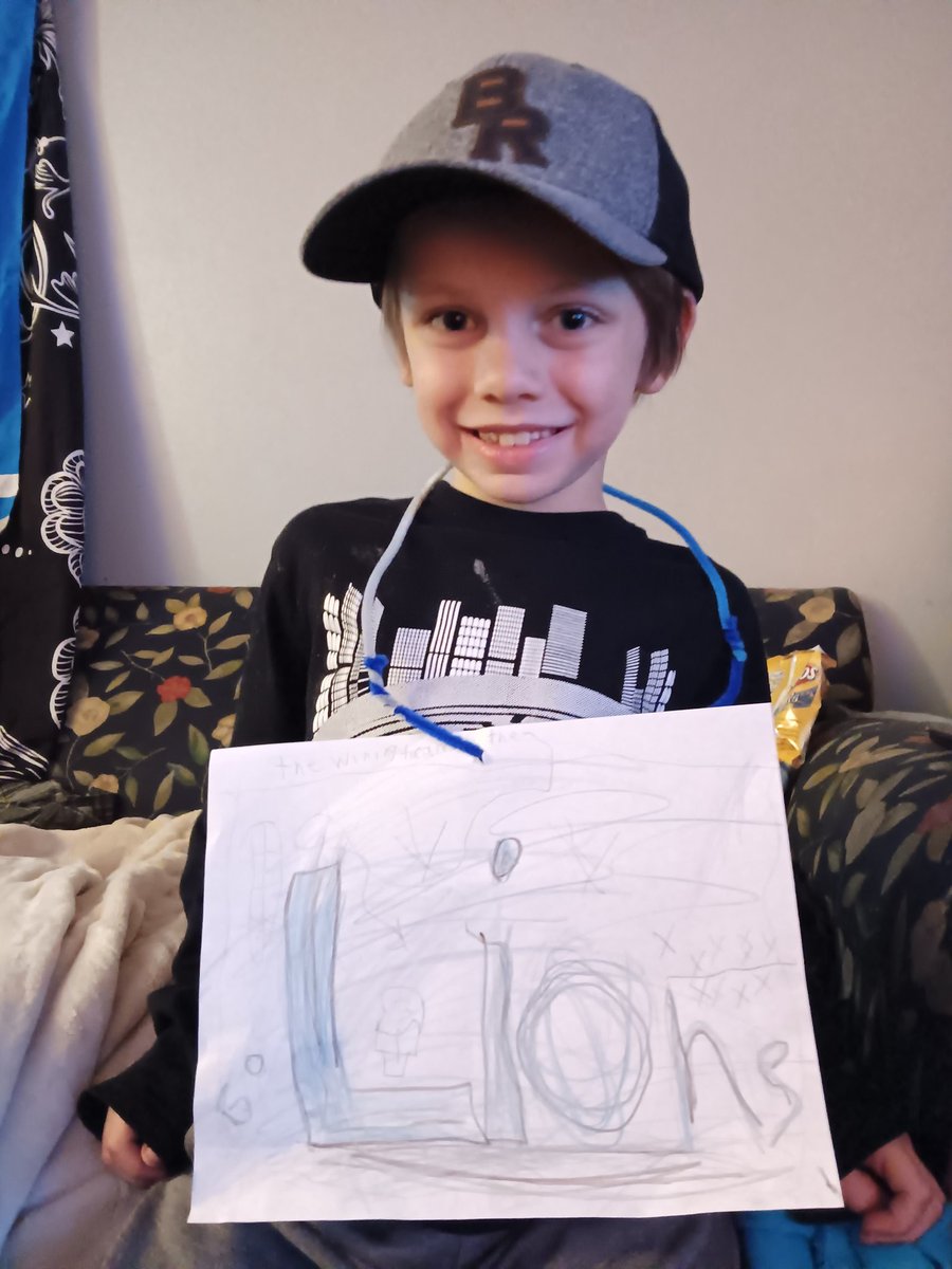 SmashStands's tweet photo. Both kiddos enjoyed the game last night. My lil guy made this with his crafting kit. :) Congrats Lions!!!! @Lions https://t.co/BnGPaJO3QO