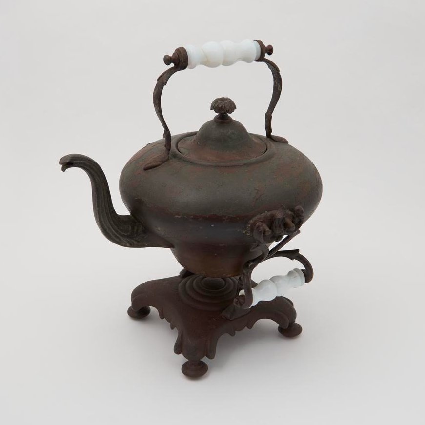 Tilting tea-kettle, heated by a metal slug, 1845, by Shoolbred, Loveridge and Shoolbred of Wolverhampton. Science Museum.