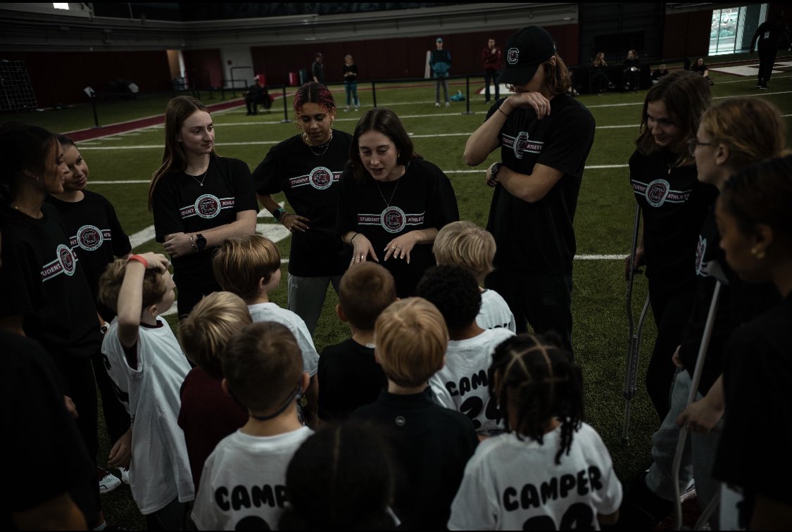 GamecockSADV's tweet photo. As MLK Day comes to an end, we’d like to highlight all of the student-athletes who served at Cocky’s All Sports Camp 🤙 
This camp served 1st-8th grade kids  from our local elementary &amp; middle schools. They learned from 10 USC teams, practiced new skills, &amp; attended the WBB Game! https://t.co/GxxBwwfLhu