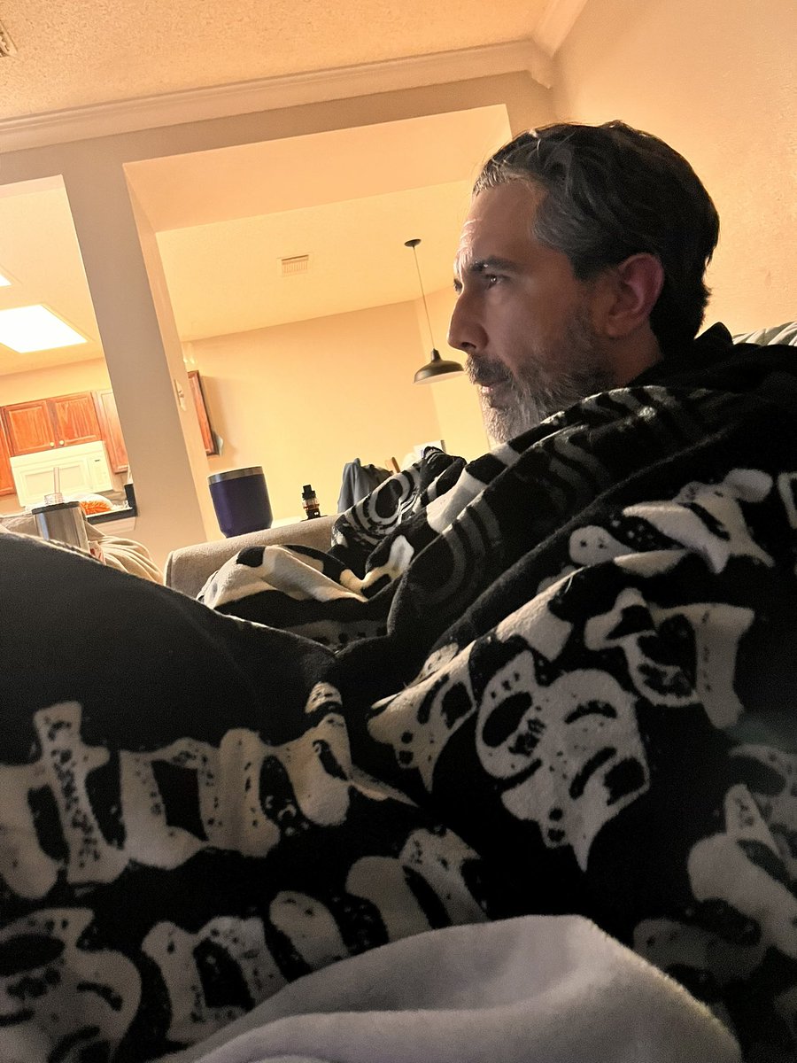 eegonzalez's tweet photo. The heat is turned on and my blanket is draped. I’m still cold. I’ve always enjoyed cold weather over hot weather. The more the years pass, the deeper the chill seeps into my bones. Apparently it brings a scowl to my face now too. https://t.co/tKuuXOx6YO