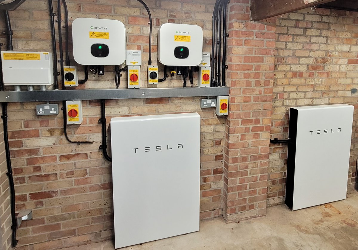GreenwireSolar's tweet photo. An 8.7kWp PV system we installed in #Newbury using 21 x Trina Solar 415W panels, with 2 x Powerwall  batteries. The Trina panels have a transparent backing sheet, helping them blend into the slate roof &amp; a high power output/small 'footprint' - the perfect choice for this customer https://t.co/Qy3HdDBzHy