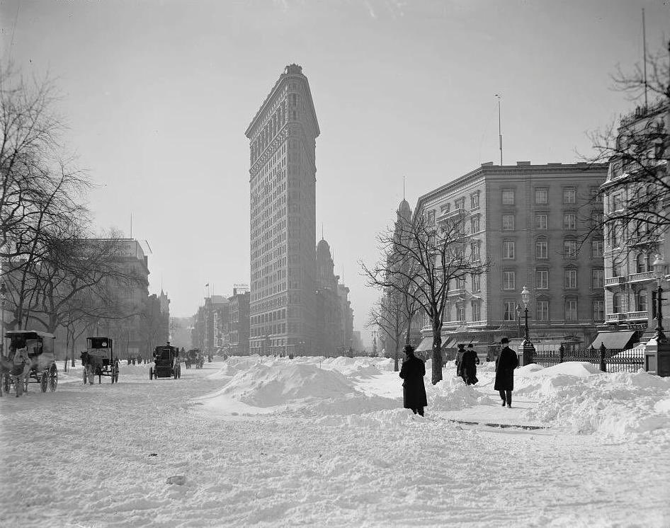 Flatiron Building NYC amid newly fallen snow, about 1905: