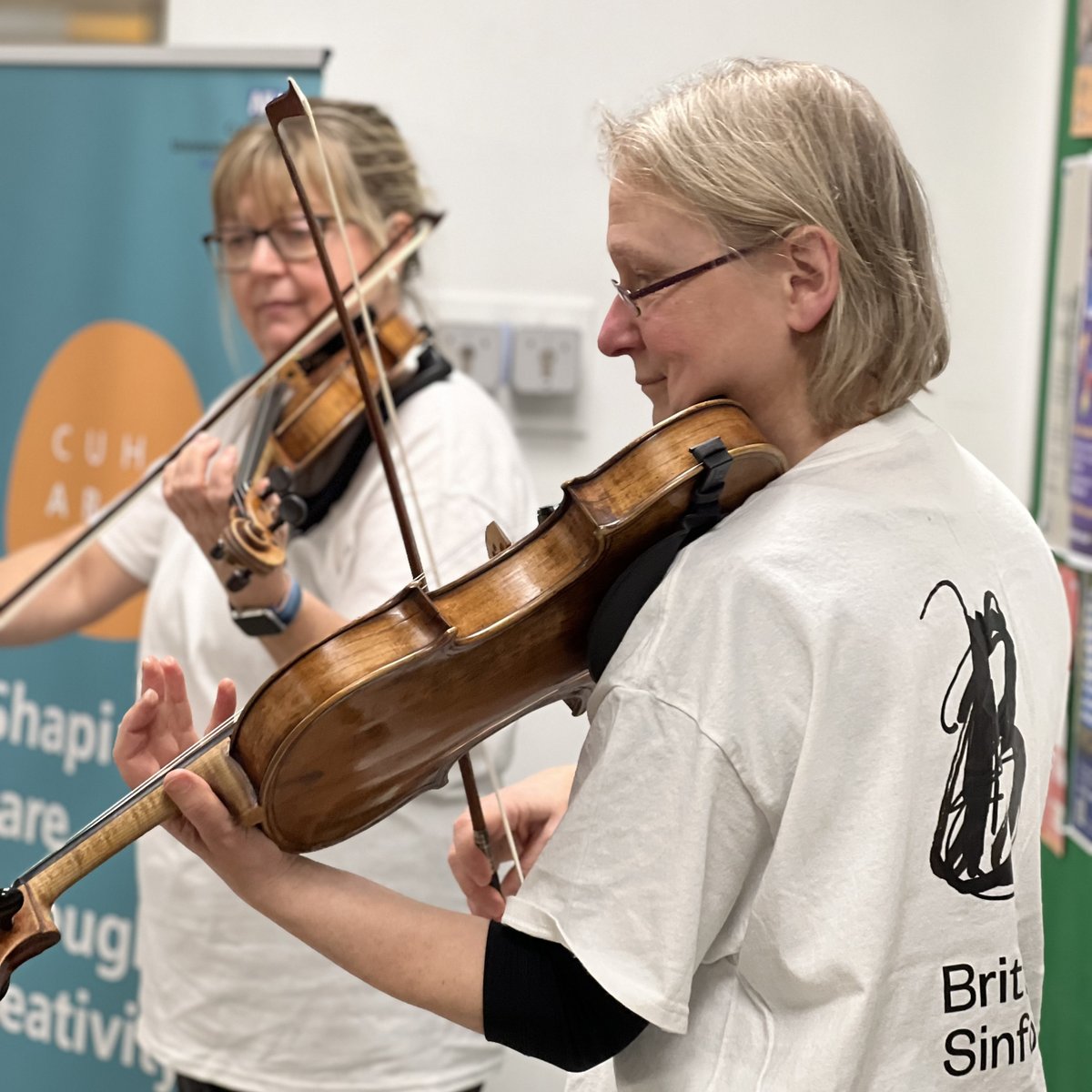 CUHArtsNHS's tweet photo. Last week we were delighted to welcome back @BrittenSinfonia🎶
Bridget and Nickie spent the day playing duets for patients and staff to enjoy, thank you for bringing beautiful music to our spaces!
#CUHsounds is generously funded by the kind supporters of @ACTcharity https://t.co/XKUULk3WgV