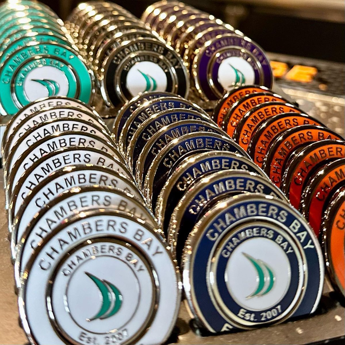 PRG_Golf's tweet photo. Accessories heaven at @ChambersBayGolf, another great #PRGProShop display. 👀
These unique ball markers designed for the Major Championship host, also include the iconic image of their 80-year-old Douglas Fir, the one-and-only tree that resides on the golf course at Chambers Bay. https://t.co/MvdIegRbH9