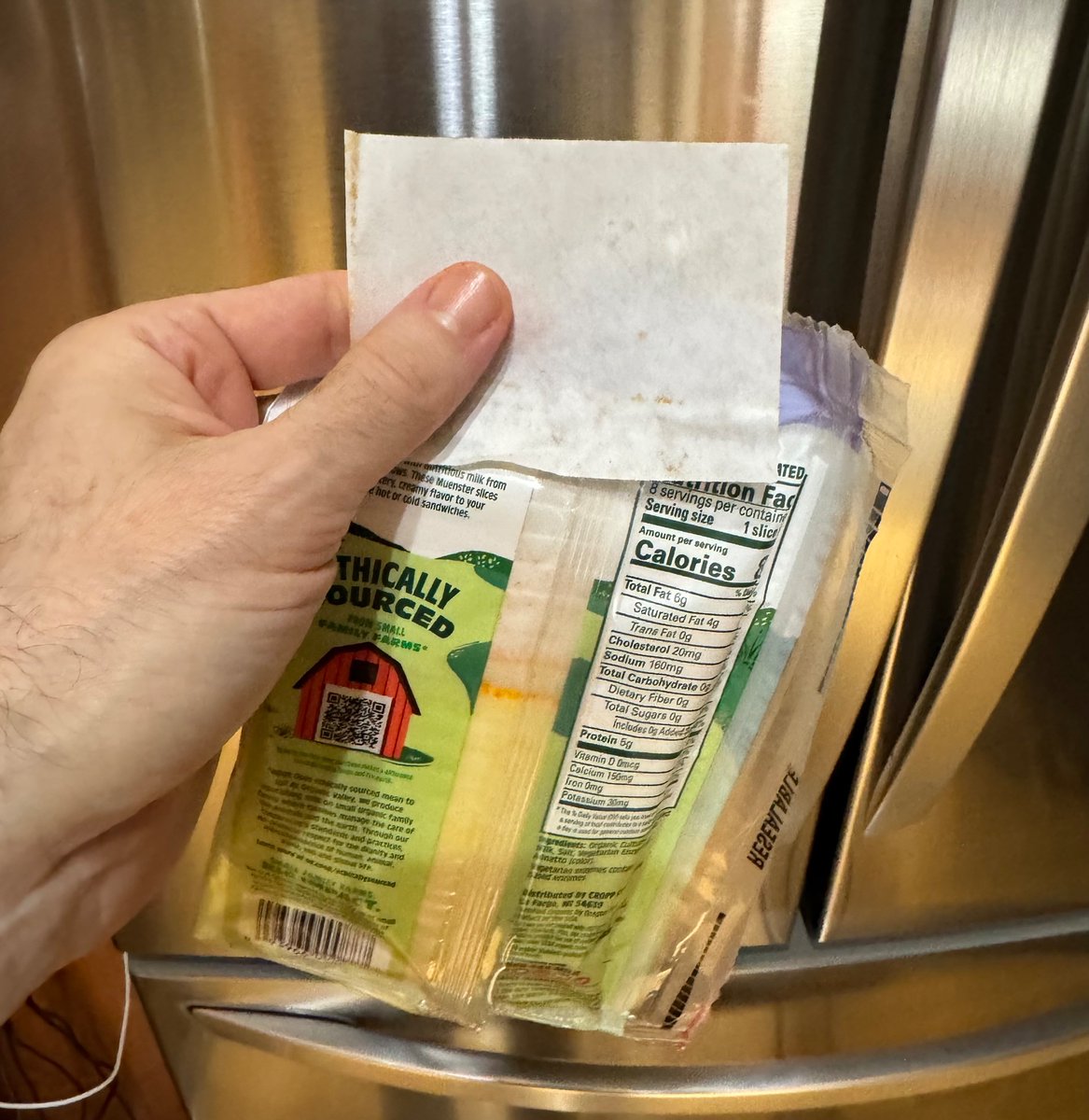 JG_CSTT's tweet photo. The cheese company has reduced the size of the wax paper sheets in between cheese slices #JoeFlation https://t.co/I5www4s5mj