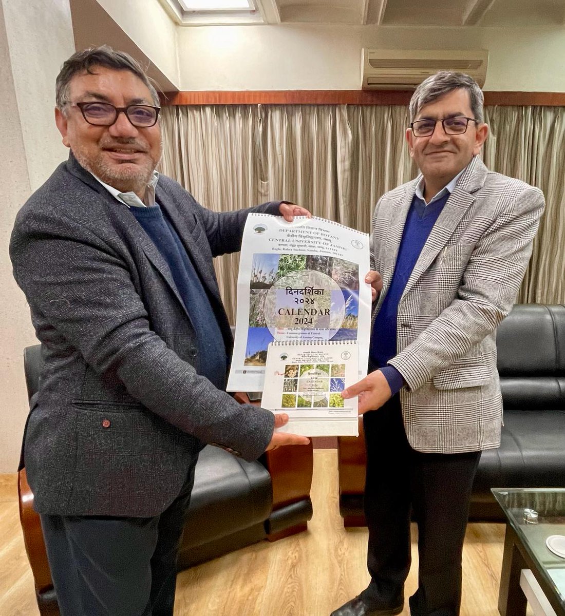 Departmental Calendar- 2024 presented to Dr. Zabeer Ahmed, Director, CSIR-IIIM by Professor BS Bhau, Head, Dept of Botany. 
It is skillfully designed by Eutierria,  Botanical Society of the university, reflecting the academic prowess and organizational finesse of the institution.