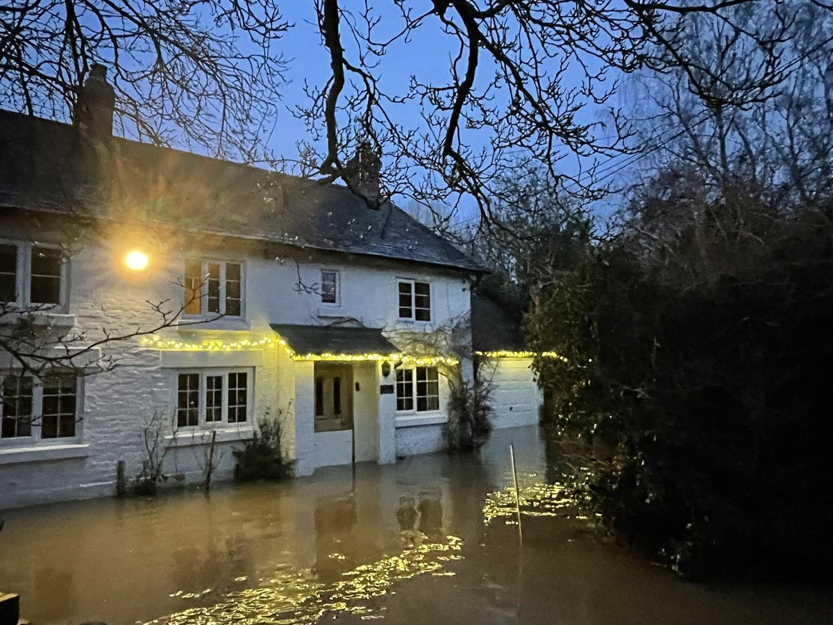 Brook Cottage still has the Christmas lights up - twinkling & reflected in the flood water, not the pretty image I imagined for season #StormGerrit #flooding #shrewsbury #riversevern #flood #floodprepared
