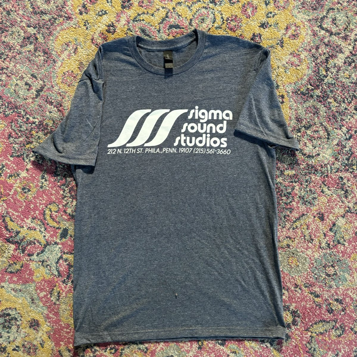 ThePhillySound's tweet photo. In our ongoing mission to save Sigma Sound Studios and The Philly Sound - we were given the blessings to recreate the original Sigma (heather blue) t-shirts you will find in a bunch of old sigma pictures.  https://t.co/W79Y0KEVaS https://t.co/IzDHXyUWMx