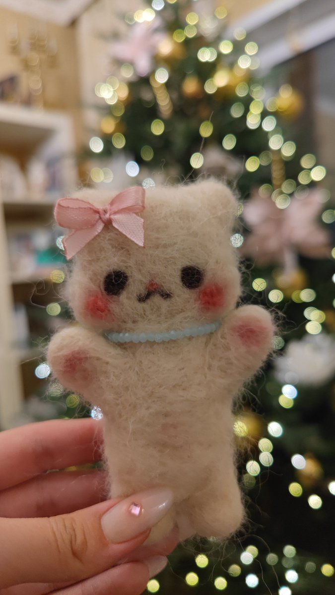 I created a lovely handmade cat toy using a mix of colorful wool, and I'm excited to show it off!