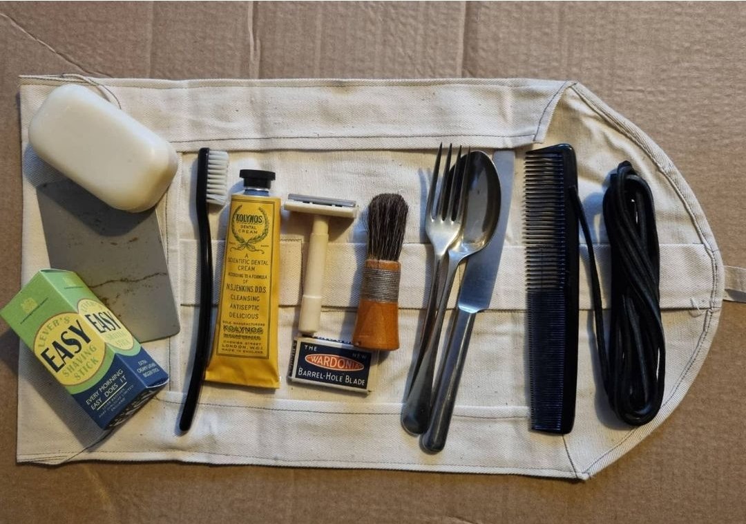 marksimner's tweet image. British Army holdall (today more commonly referred to as a wash roll) broadly representative of items typically carried late in the Second World War. Most items are original from the period, the toothpaste, shaving stick, and soap being reproductions. #WW2 #SmallKit