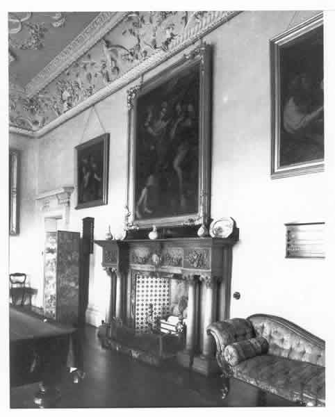 KenureP's tweet photo. On the mantelpiece in the Billiard Room, the Palmer family crest and year of marriage of the last Sir Roger and Lady Palmer were engraved seen here in a still from the film Face of Fu Manchu 1965 https://t.co/I3gnseDLXy