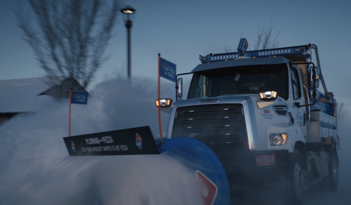 dominos's tweet image. You: there’s 6 feet of snow how will i get my pizza? 

Us: Bet