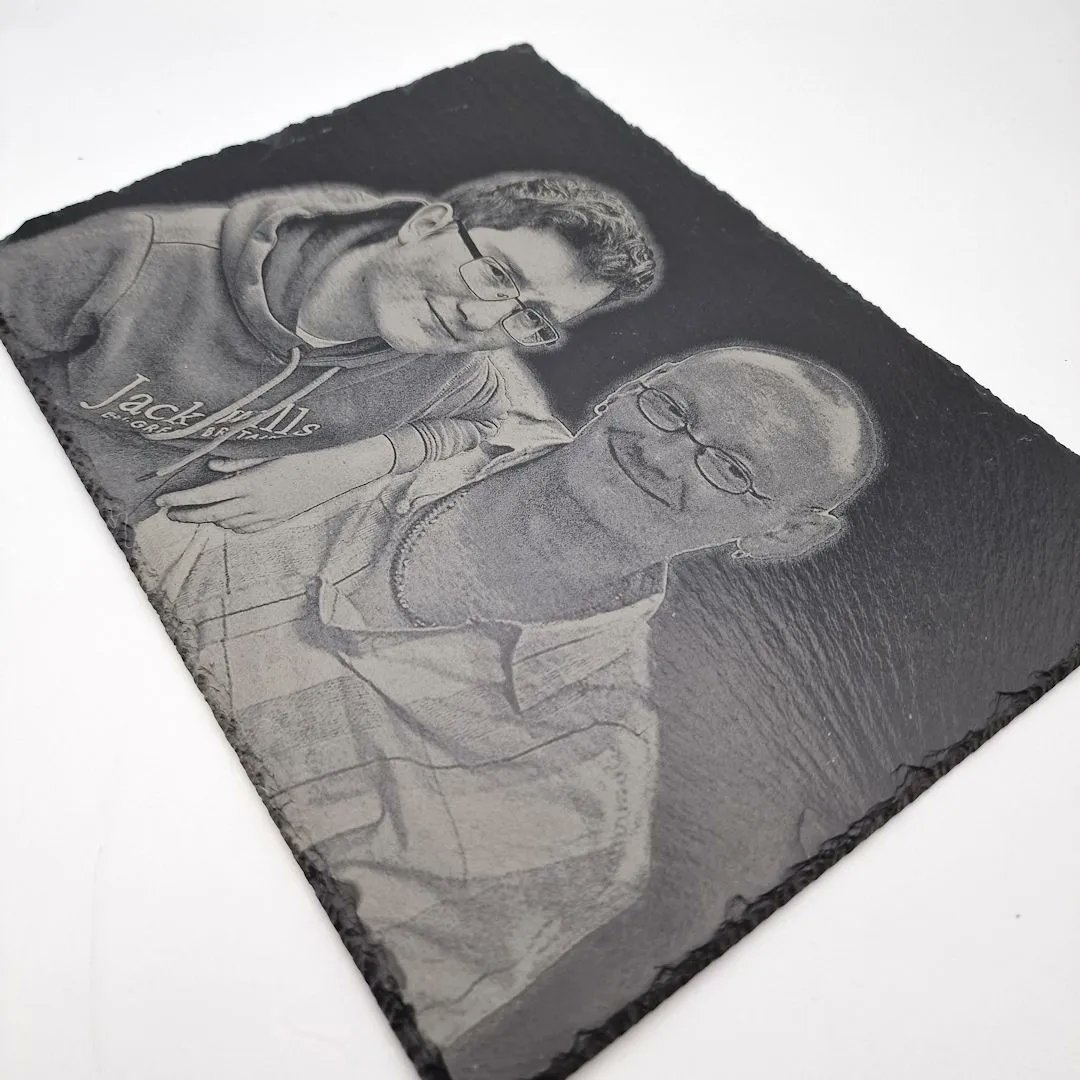 These 3 slate engravings were a real pleasure to engrave ❤️ 

Unfortunately, the young men's Dad passed away 13 years ago when they were so young. Their mum reached out to us to see if we could put 2 photos together to have a recent photo of them with their Dad.

2/3