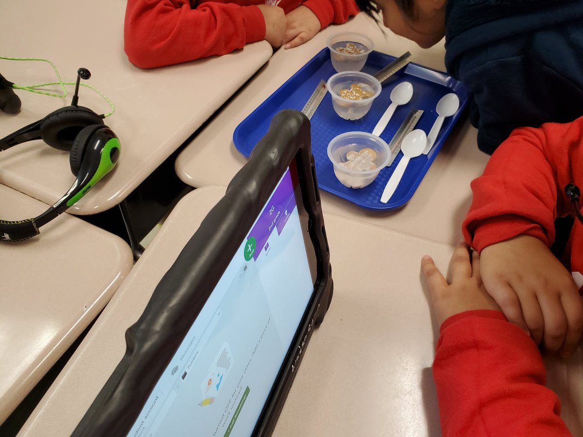 Experiments with Gingerbread cookies,  Peeps, thermometers, ice, Seesaw = High Engagement for MLs at East! <a href="/EastESNC/">East Elementary School</a> <a href="/es/">ES</a>