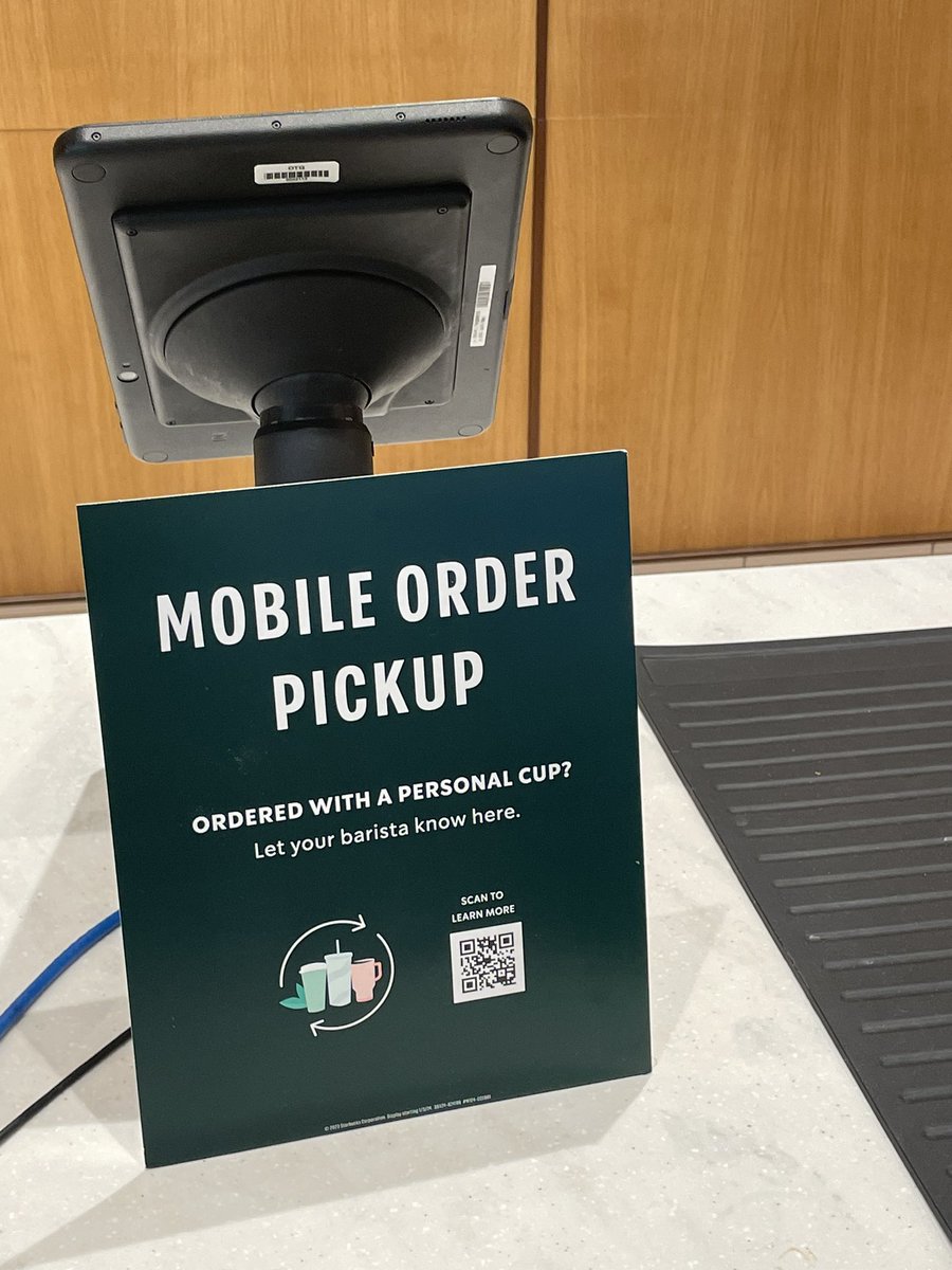 This is what it looks like in NYC from what I saw today. @Starbucks has a separate area with a POU device that you walk up to with your personal cup instead of the regular register.