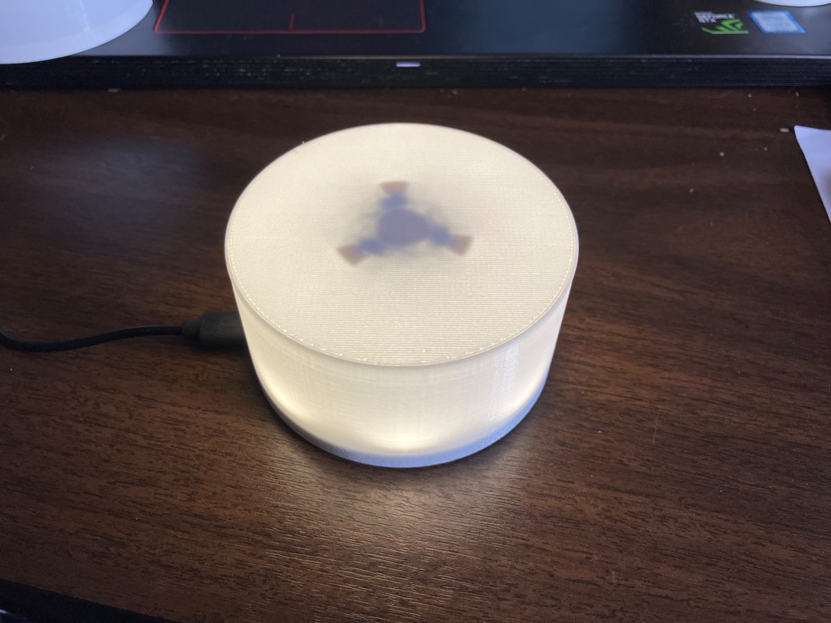 flnwell's tweet photo. First prototype is a good starting point but there’s lots of room for improvement.

Proves that the print diffuses the LEDs and it’s satisfying to look at / use.

But it’s floppy, the button travel is restricted and the central mechanism is overcomplicated. https://t.co/e7pwdaWiZi