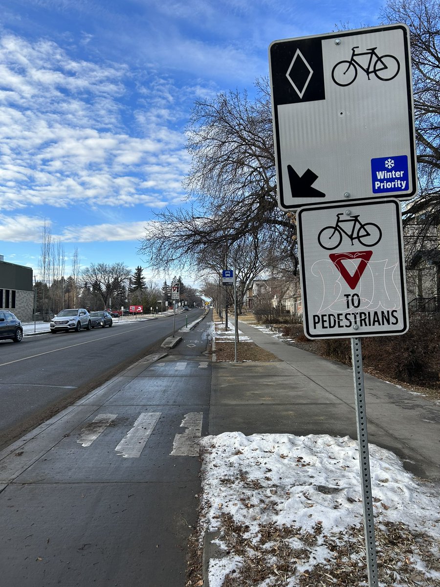 dsabo14's tweet photo. Noticed these blue decals popping up on #yegbikelane signs on 110 st and 76 ave. Are they going to be on all separated bike lanes? Or just some? https://t.co/xoizIqcaPA
