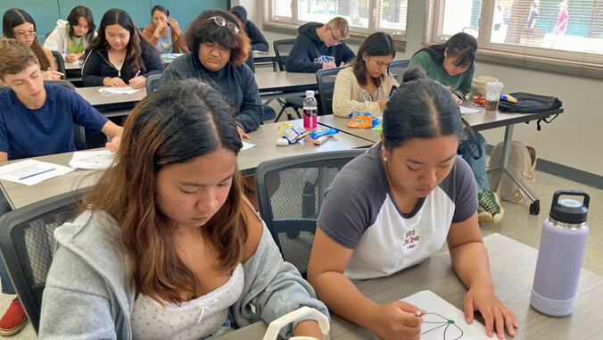 uhmanoa's tweet photo. Math on Maui: #UHManoa faculty, students spread knowledge and cheer - The @UHManoaMath team worked with keiki from Maui high schools and at Nāpili Noho ➡️ https://t.co/4OCJjw3Bgo #UHinTheCommunity https://t.co/UIxuv31Hd2