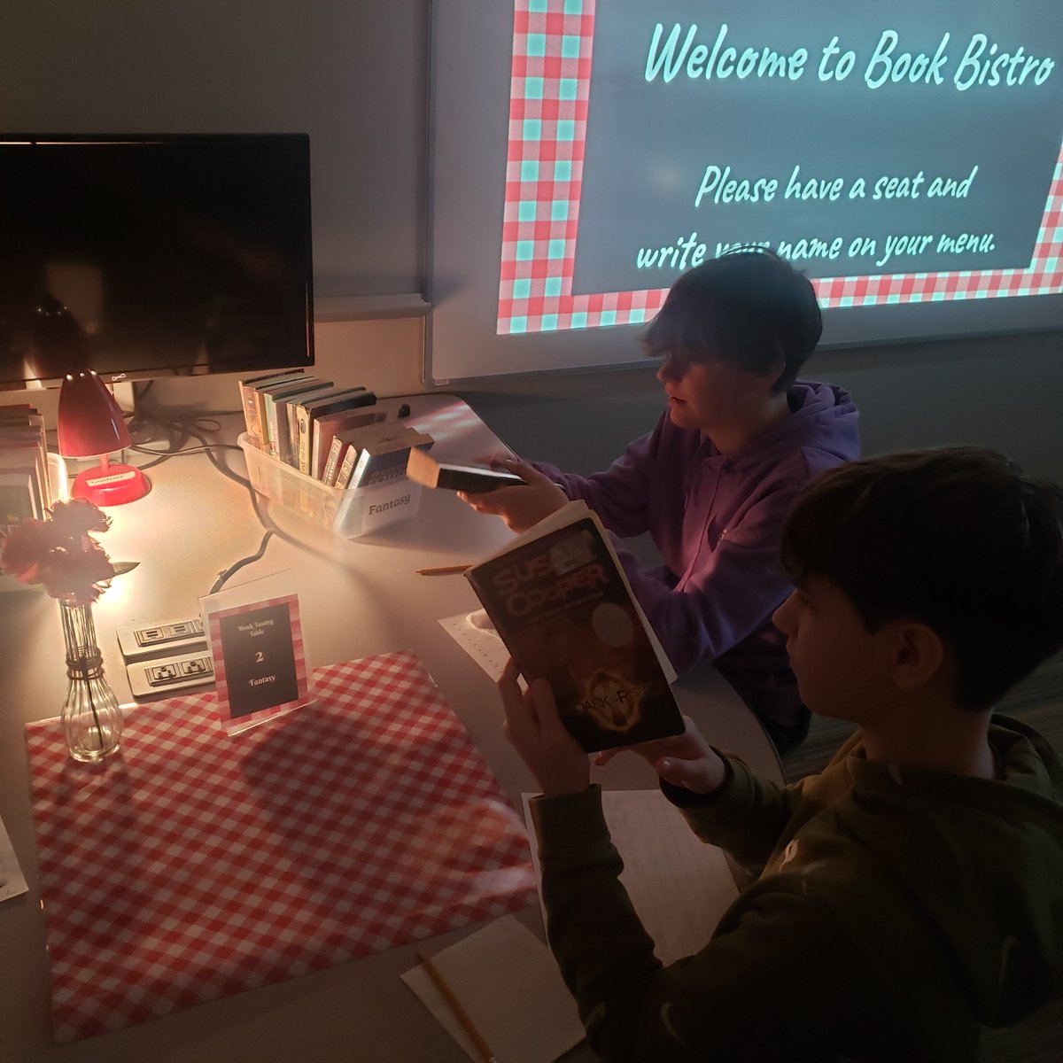 NRCSRangers's tweet photo. #FeelGoodFriday Students in 7 Purple participated in a multi-course "book tasting" today, complete with appetizers, ambiance and classical music.They rotated through stations containing various books and genres, diligently creating a list of book titles they want to read.@8208DOD https://t.co/B1a3cfWZEC