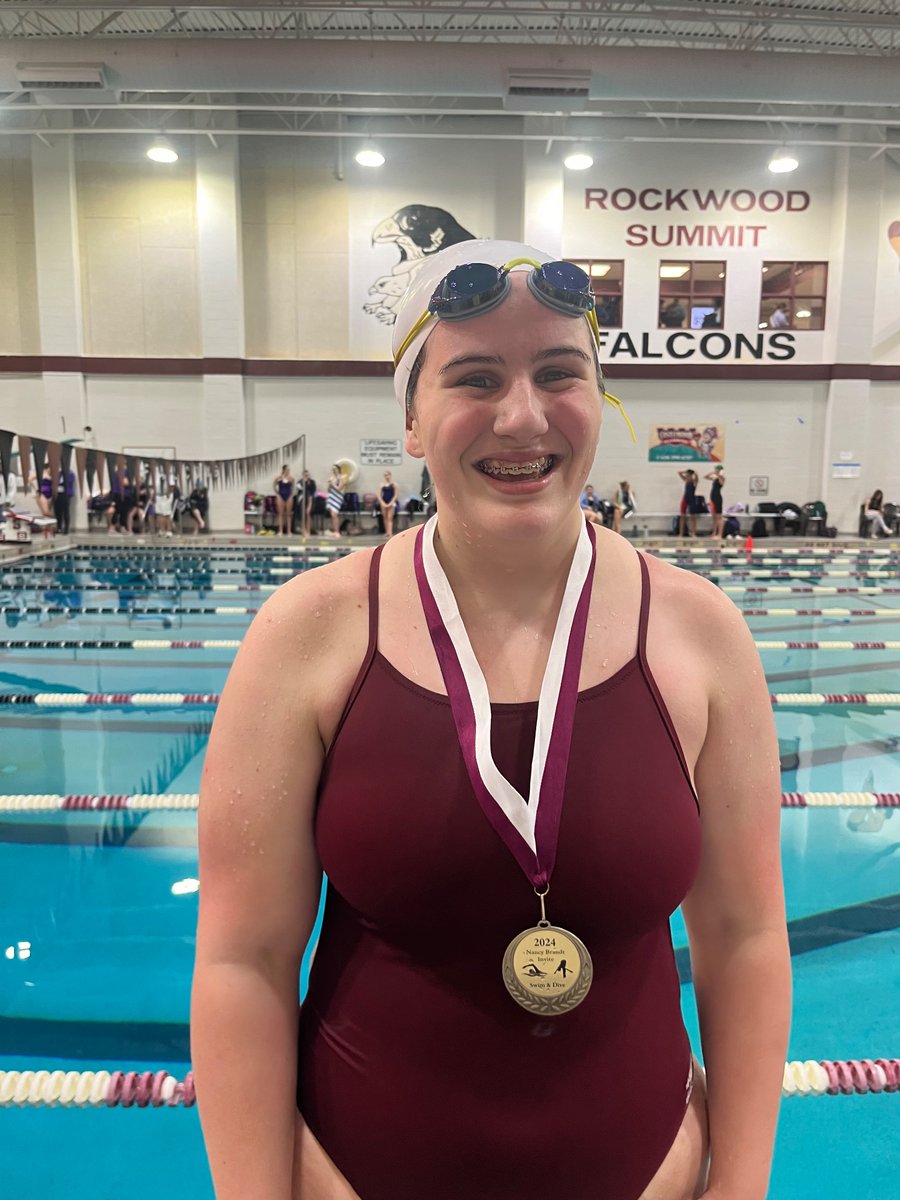 Clara Budge placing 5th in 100 Butterfly!