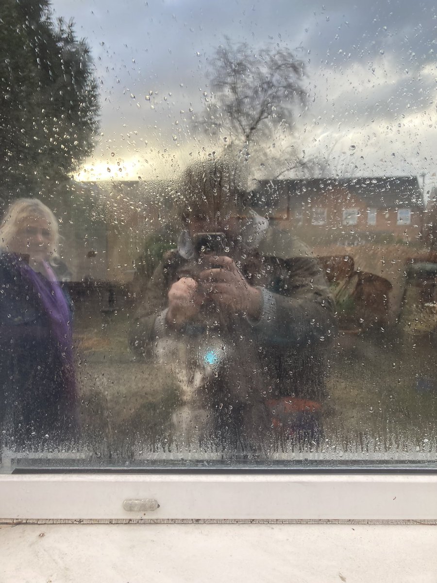 Uncharted_UK's tweet photo. New Year, New perspective. I thought of this phrase when taking this photo of me and mum looking at her dog on the other side of the window. In many ways 2023 was a success but I agonize over what more I could've done. I'm trying to balance being proud but wanting more in 2024 https://t.co/PURofIkAjn