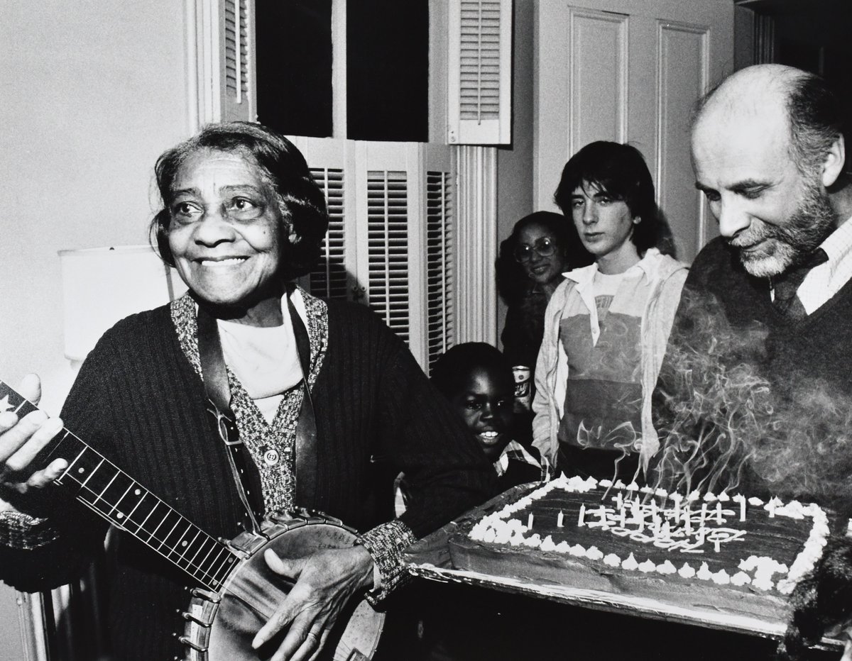 Remembering musician and songwriter Elizabeth Cotten (1/5/1893 – 6/29/1987) on her birthday. Born in @CarrboroGov Photo w/ folklorist Ralph Rinzler: by Roland L. Freeman. From the Roland L. Freeman Collection (#70147) @SFolklife @WilsonLibUNC @UNCLibrary @SmithsonianFolk