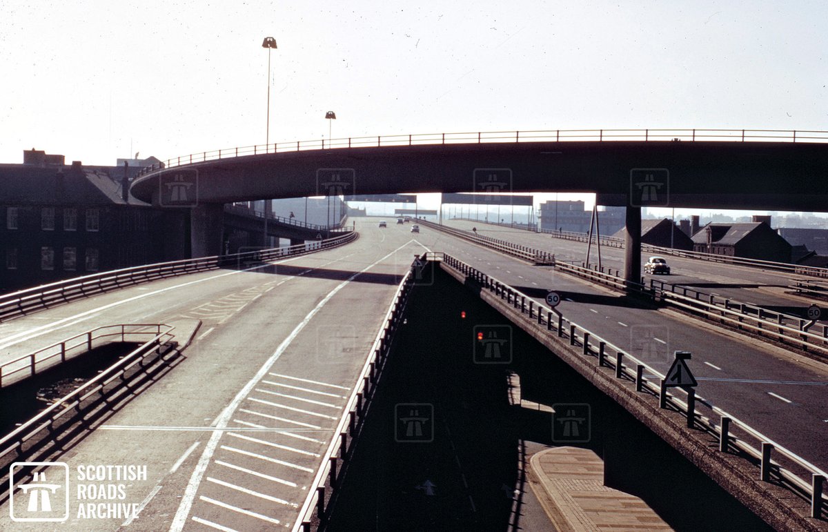 Looking south across the #M8 Kingston Bridge from the Anderston Footbridge in the mid-1970s. You can learn more about the history of the bridge on our recently updated web article here: tinyurl.com/34n6wpdc 💻📲 #Archives #Glasgow