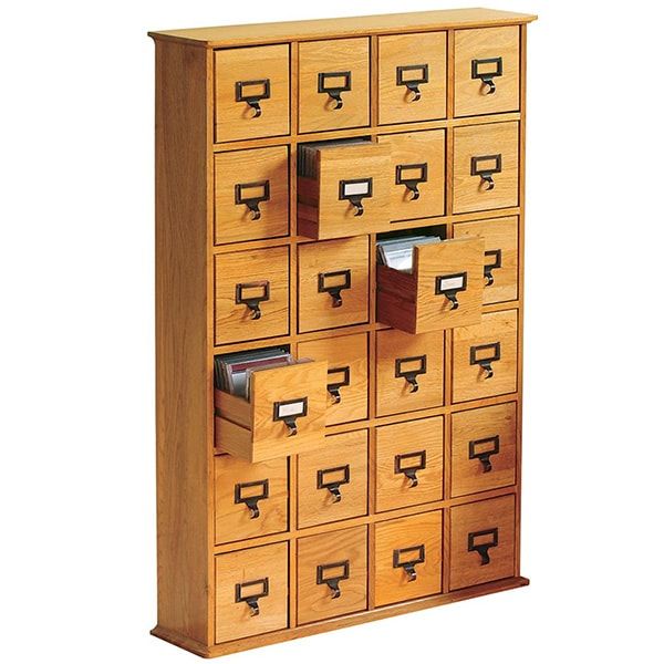 File and protect your music or audio CD collection in this beautiful furniture piece that doubles as a sturdy and functional storage unit. Library-style drawers have vintage finger-pull hardware with label slots. Shop Now: bit.ly/3NrtLs0 #organize #storage