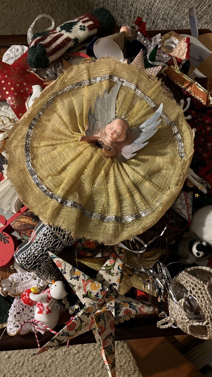 Time to say bye bye for another year. Each one holds a story of a person, a time, a place. Top of the tree angel spanning 60+ years. She is loved. #WhatAPrivilege #12thNight