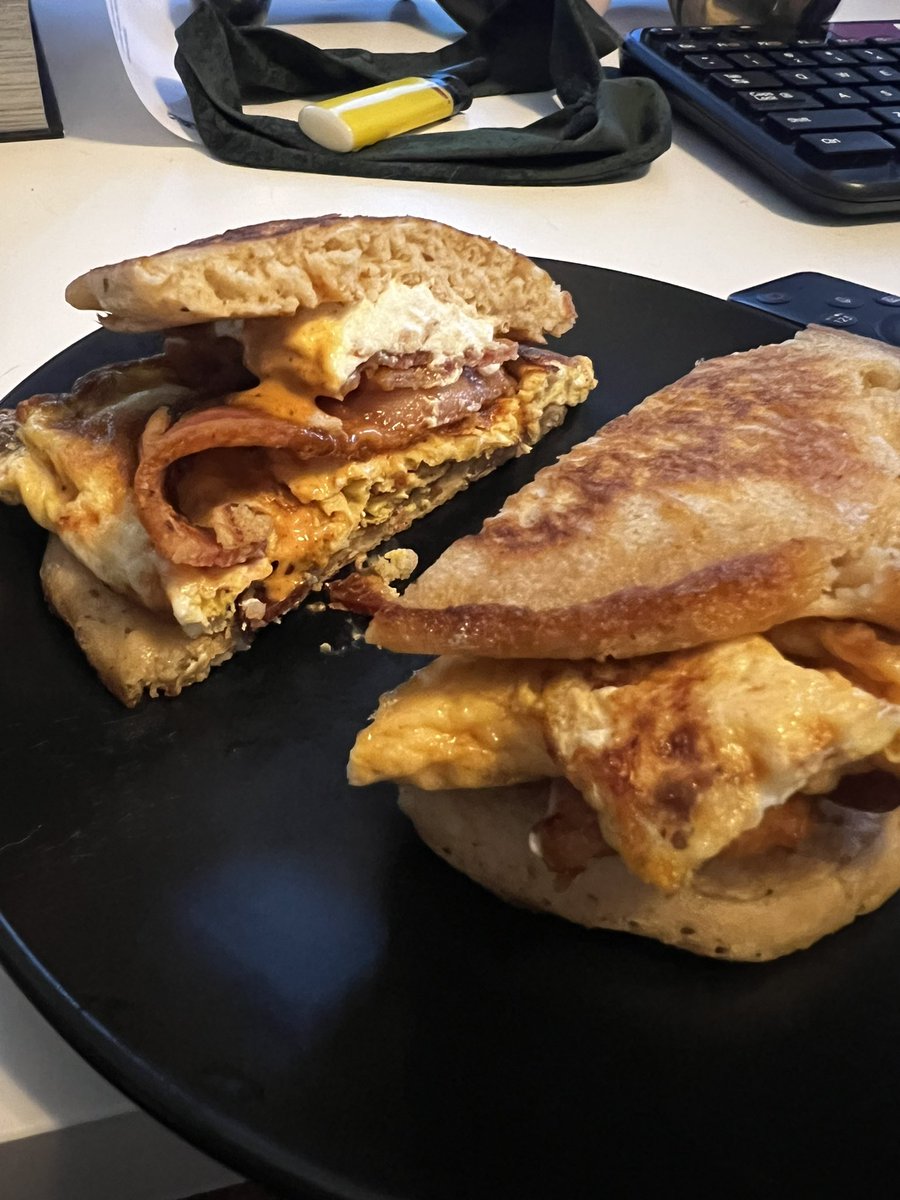16BitPicnic's tweet photo. I’ve been really unhinged about brekkiewiches recently so here’s one I’m calling the Hot Girl Brain. 
It’s two pancakes, thick cut bacon, goat cheese, chipotle aioli, and an omelet.
It’s fucking delicious. https://t.co/wwyQEz4NvU