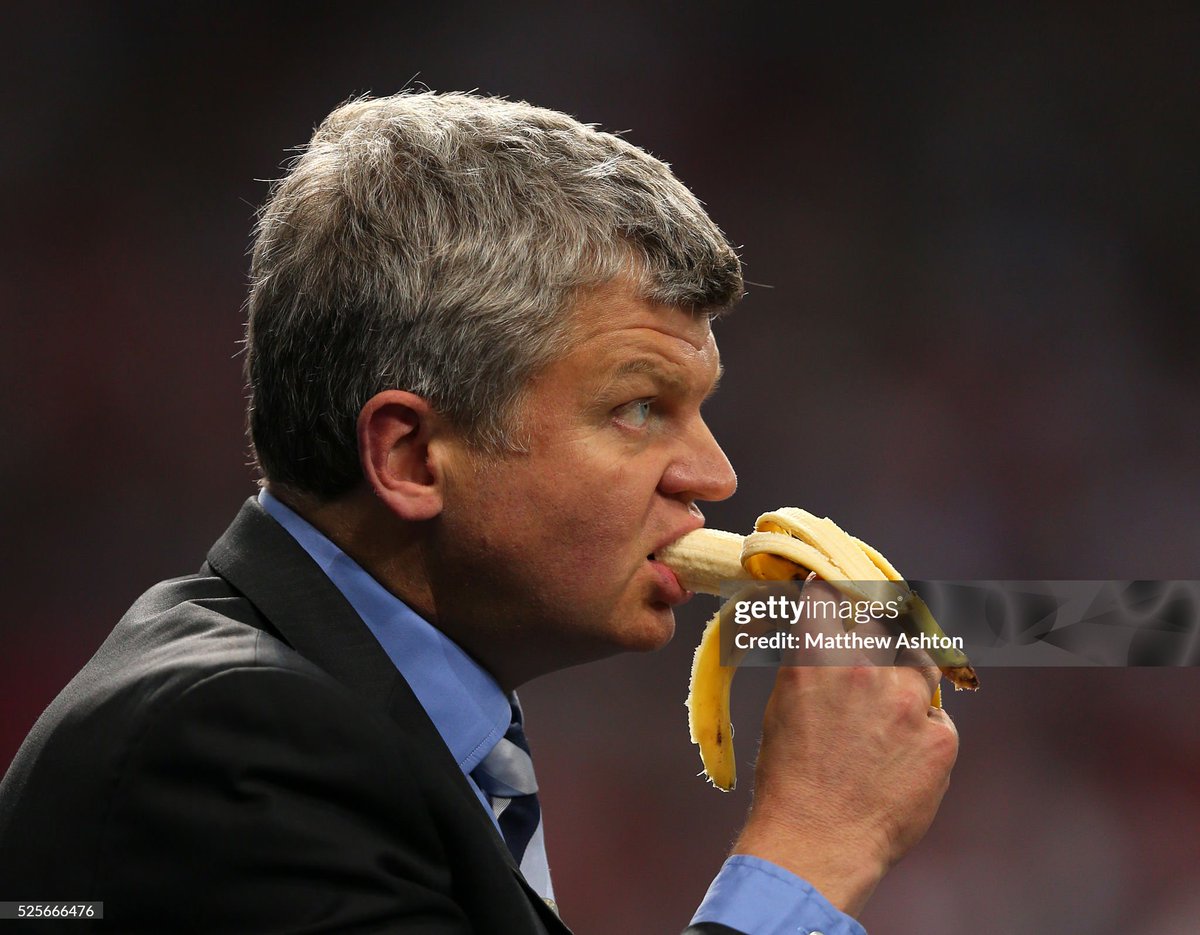 shitbritishpics's tweet photo. ITV Sport Presenter Adrian Chiles eats a banana during the second half of the FIFA World Cup Qualifier - Group H - Ukraine v England (2013) https://t.co/29yzrJ6OGJ