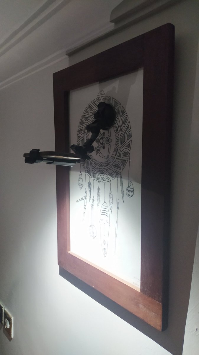 kashgohel's tweet photo. As a designer I've always loved the phrase 'He loved to the point of invention'. We don't have power at home so for my grandparents' dinner, I rigged up a phone with a gopro mount to a hanging artwork. Instant dining light. Looks so quaint. 😊 #design #outofbox https://t.co/tDc0qlcA5x