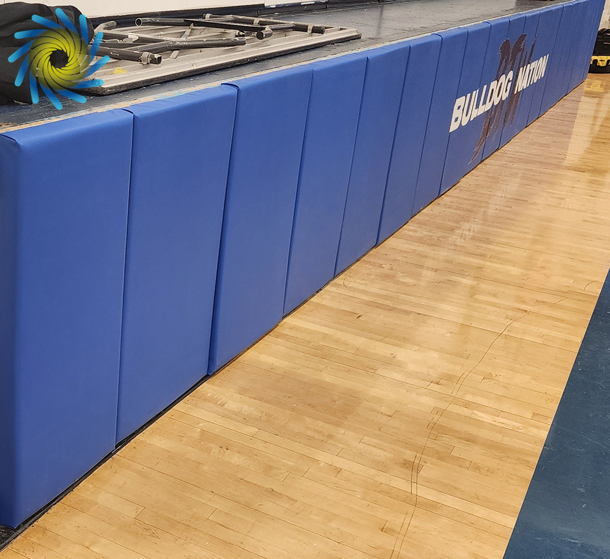 WindscreenFctry's tweet image. #Wallpadding is an important safety measure, offering protection against injuries. Additionally, #sportsbranding on these paddings strengthens a teams visual identity. To get vinyl-covered wall padding for your facility, call The Windscreen Factory at (888) 619-2228 today.