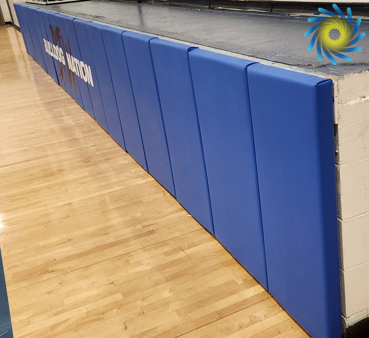 WindscreenFctry's tweet image. #Wallpadding is an important safety measure, offering protection against injuries. Additionally, #sportsbranding on these paddings strengthens a teams visual identity. To get vinyl-covered wall padding for your facility, call The Windscreen Factory at (888) 619-2228 today.