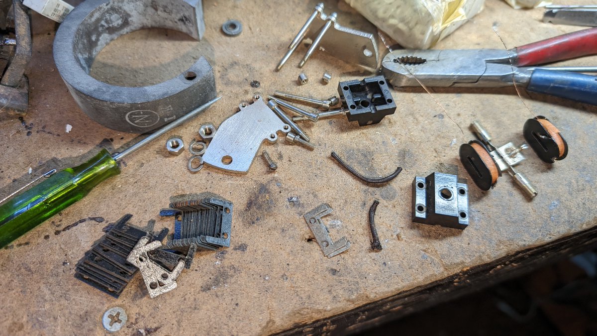 It was open, and I pulled the driver apart, impressed with the construction enough to attempt a rebuild.