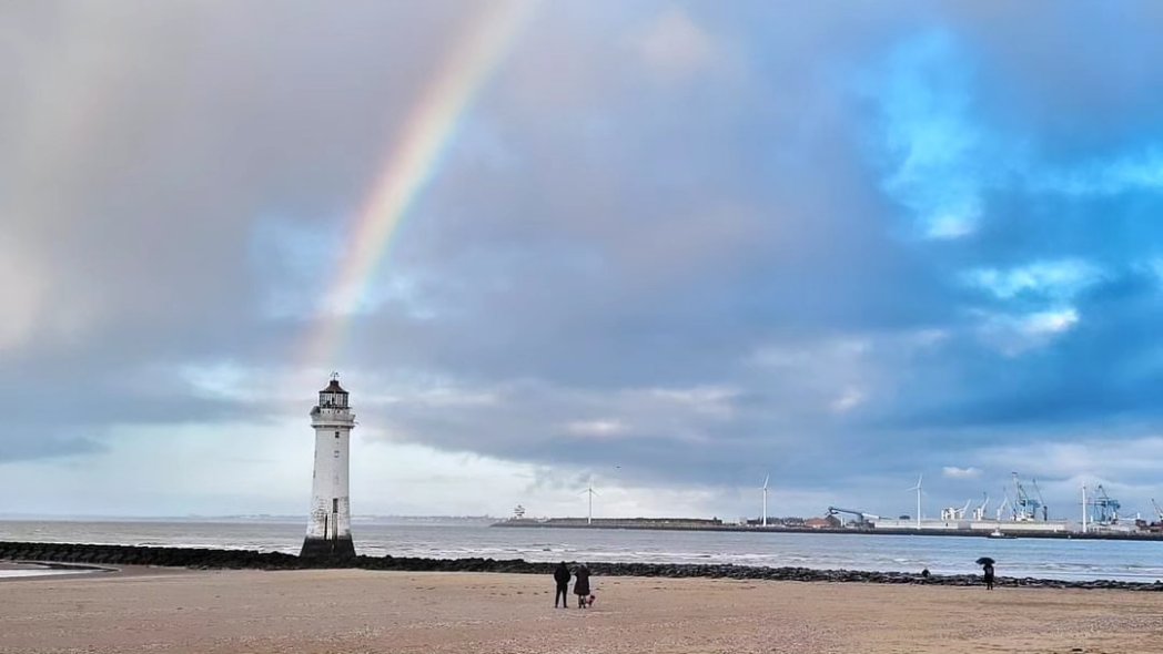 A rainbow over New Brighton lighthouse earlier today