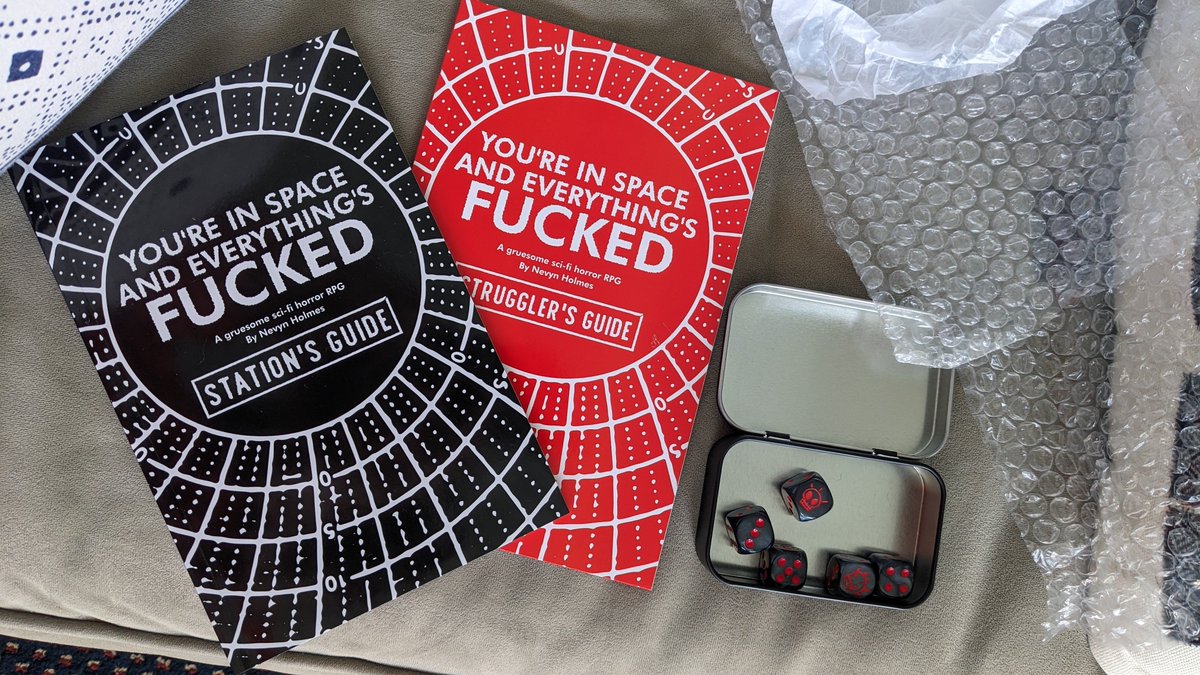 cherrydrop's tweet photo. GOOD MAIL DAY
let's gooooooo
So excited to have @DinoberryPress's You're in Space and Everything's Fucked and these adorable d6's. God I'm so excited about the dice they're such a fun design https://t.co/BF1BeGXGfA