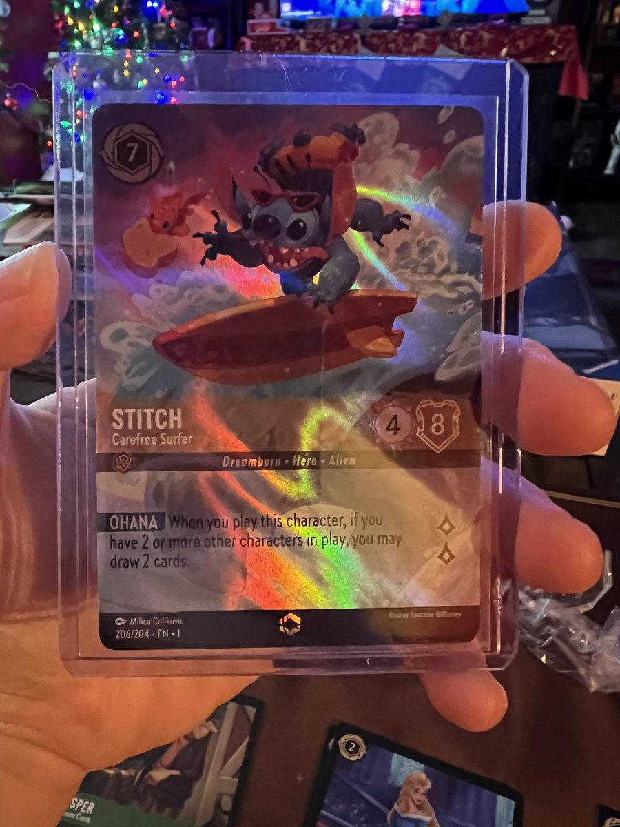 Grumpy0lly's tweet photo. Pulled this enchanted surfer buoy the other day and couldn’t be happier! #Lorcana #EnchantedPulls https://t.co/MxzLVhpjji