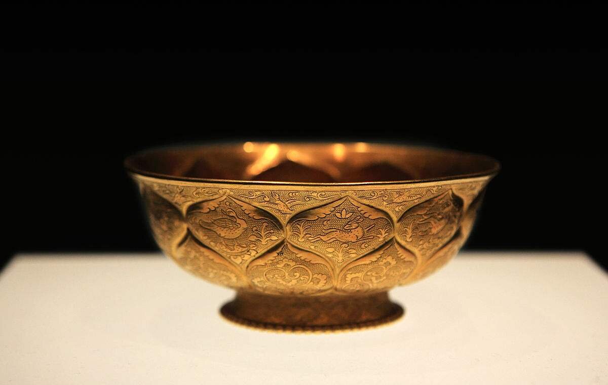The Gold Bowl with Mandarin Ducks and Lotus Petals of Tang Dynasty (618 - 906), unearthed in 1970 in Xi'an, China. The Bowl masterfully featured two layers of lotus petal engravings outside, with each lotus contains ten petals. It is exhibited in Shaanxi History Museum.