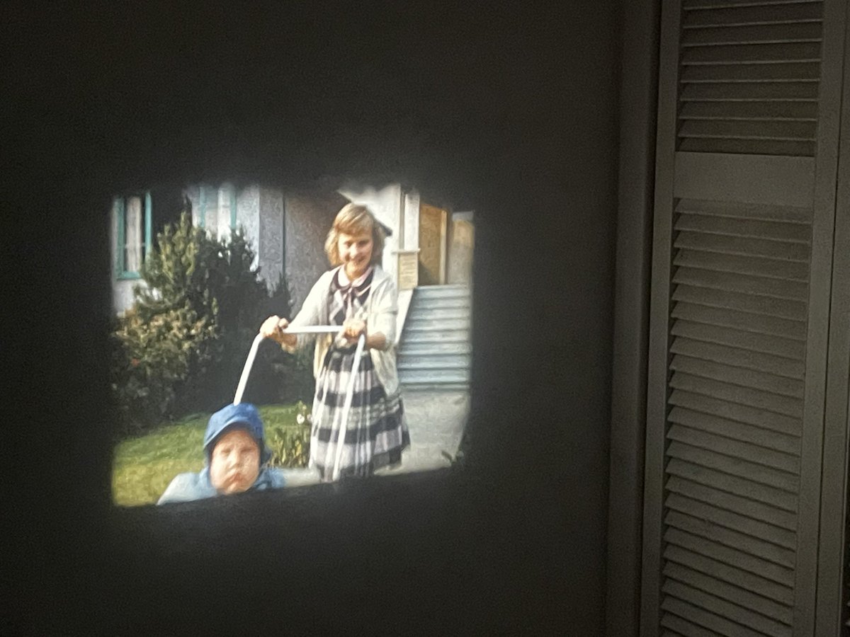 I left my 12-year-old and his friend alone for 10 minutes, only to discover they’ve set up a portable film projector and are watching home videos from 1959 discovered in a thrift store. This archivist’s heart is full ❤️ #archives #thriftstore #film