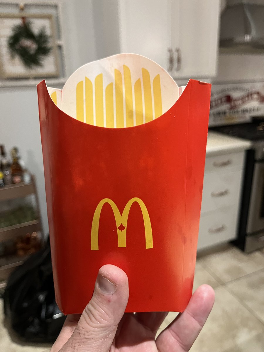 RandyT77's tweet photo. @McDonaldsCanada  I am at a loss, what do I need to do to ensure when I order a lg fry the box is filled? You charge me over 5 bucks for a lg fry and this is what I get when I open the bag at home!!  Do you see any fries? https://t.co/XOFRJ0wDEC