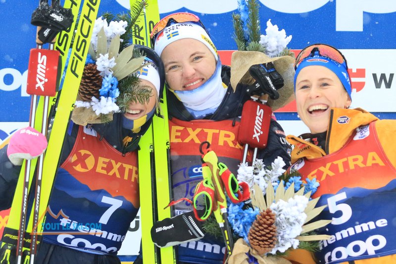 Toutleski's tweet photo. Cross Country Ski World Cup in Lago Di Tesero, Italy on January 6, 2024. At the stadium of the next Winter Olympic Games Milano Cortina 2026, podium of the Mass Start Classic Race of Tour de ski  Karlsson Frida, Linn Svahn Katharina Hennig #tourdeski https://t.co/8NBUZNTZFJ https://t.co/ZSZKq517Pg