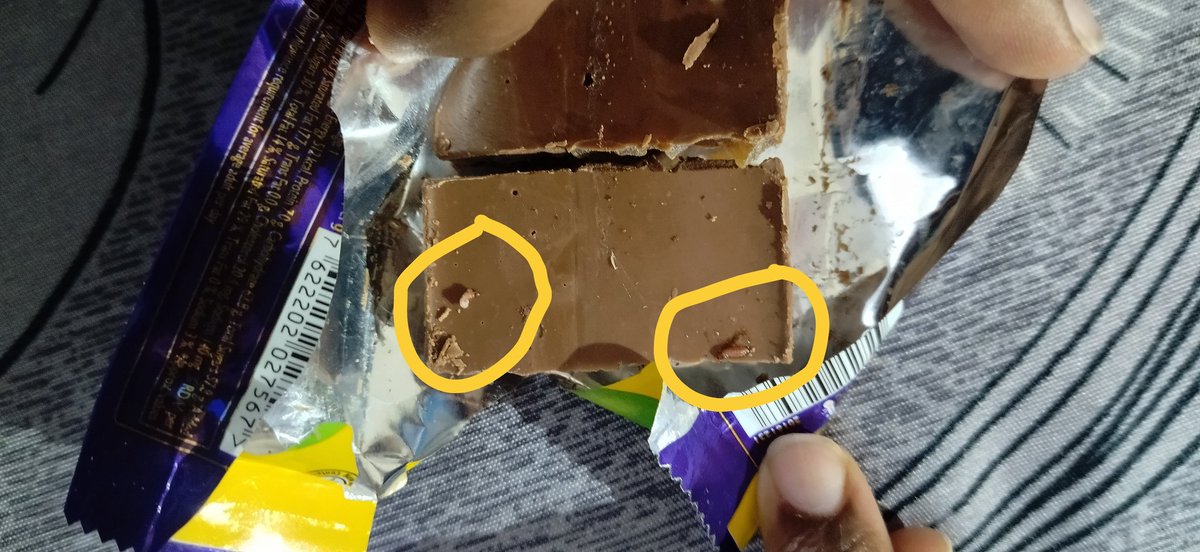 Sakthisathish60's tweet photo. @DairyMilkIn 
utterly disappointed with this, today we bought Cadbury dairy milk tangy mango for my brother's child, we found that worms are crawling in it.

at first we suspected that the pack could be puffed, so we checked throughout the package, it was not damaged. https://t.co/OqIR61HzIY