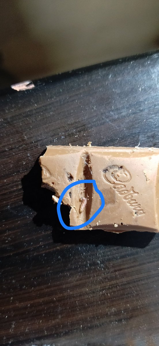 Sakthisathish60's tweet photo. @DairyMilkIn 
utterly disappointed with this, today we bought Cadbury dairy milk tangy mango for my brother's child, we found that worms are crawling in it.

at first we suspected that the pack could be puffed, so we checked throughout the package, it was not damaged. https://t.co/OqIR61HzIY