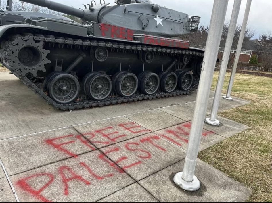 GraffitiRadical's tweet photo. Anti-war graffiti seen at a military monument in Lexington, Kentucky https://t.co/j7JdZxxKkh