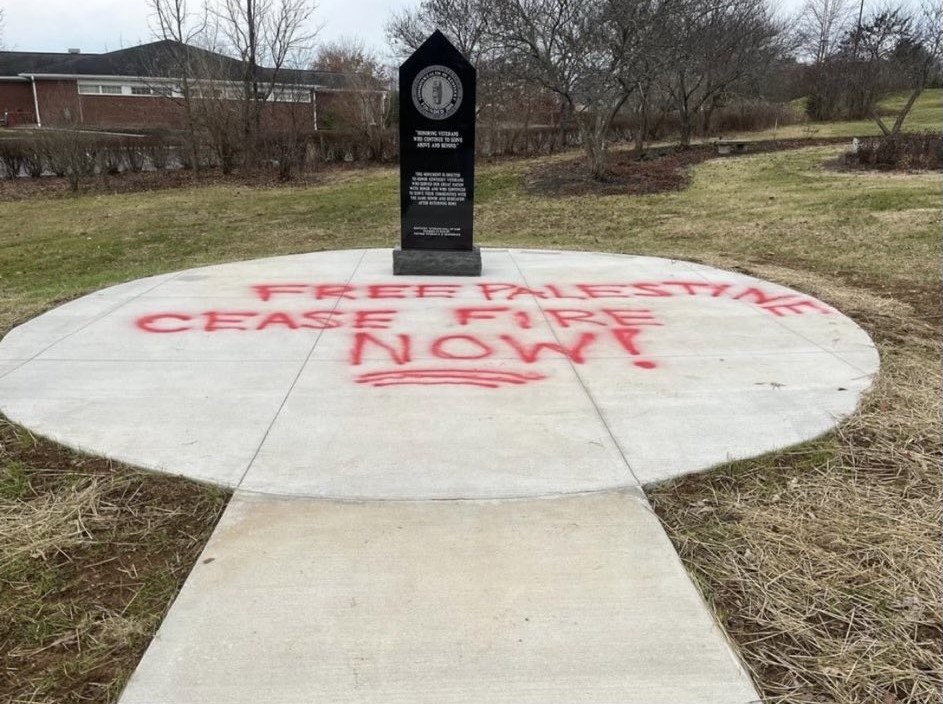 GraffitiRadical's tweet photo. Anti-war graffiti seen at a military monument in Lexington, Kentucky https://t.co/j7JdZxxKkh